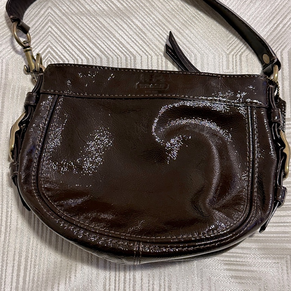 Coach Zoe Mini Chocolate Patent Leather! Pre-Owned in good condition.
